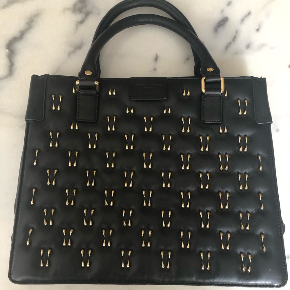 Olivia Harris black leather bag with gold accents